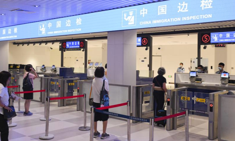 Passengers go through border control at the international terminal of Sanya Phoenix International Airport in Sanya, south China's Hainan Province, July 26, 2023.
The main works of the renovation and expansion project for the international terminal of Sanya Phoenix International Airport has been completed and put into use on July 1, as Hainan Province is preparing for island-wide independent customs operations by the end of 2025. (Xinhua/Yang Guanyu)